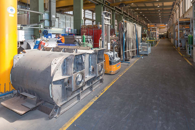 Ligne de production des malaxeurs à doubles arbres horizontaux au sein de l’usine BHS-Sonthofen. [©ACPresse]