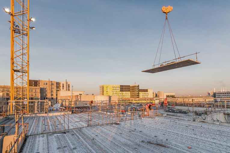 Prédalles mises en œuvre sur un chantier de bâtiment. [©Rector]