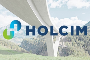 Logo Holcim sur fond de paysage de montagne.