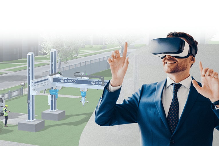 La solution VR permet aux personnes de regarder les bâtiments imprimés Cobod en cours de construction dans une zone résidentielle virtuelle. [©Cobod]